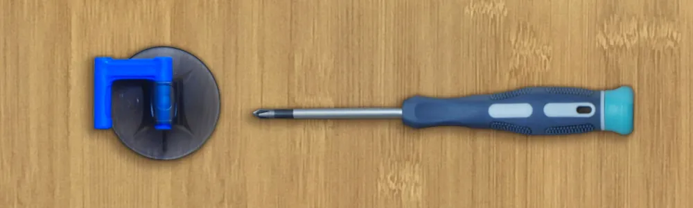 Use a screwdriver and suction cup to remove the back panel. Use a screwdriver and suction cup to remove the back panel.